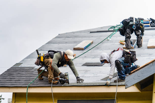 Professional Gutter Installation technician working in Seahurst, WA